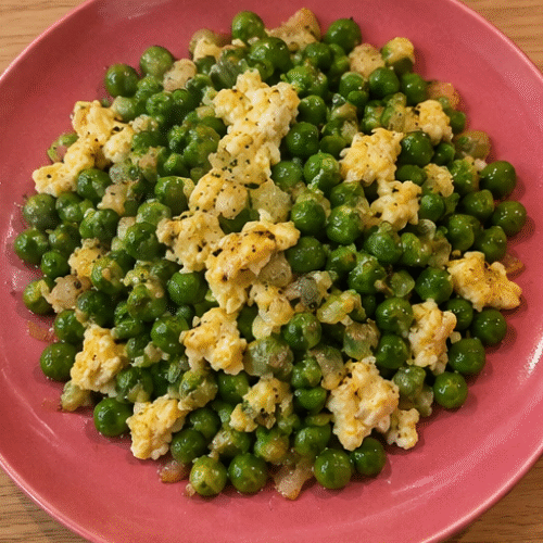Guisantes salteados con huevo